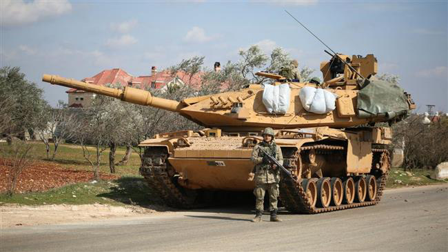 Thổ Nhĩ Kỳ bị QĐ Syria vây đánh tứ phía: Xe tăng, xe bọc thép liên tiếp cháy rụi - Ảnh 1.