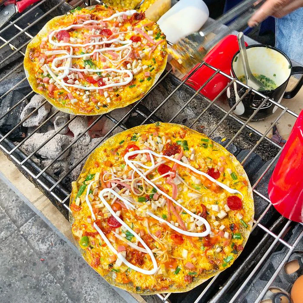 Khách Tây trầm trồ trước pizza kiểu Việt Nam, nhận xét nó thật sự giàu hương vị - Ảnh 1.