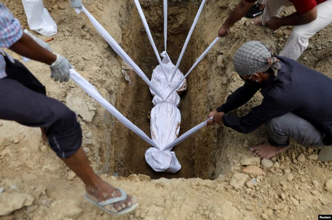 7 ngày qua ảnh: Công nhân làm việc trong lò thiêu xác ở Mexico - Ảnh 9.