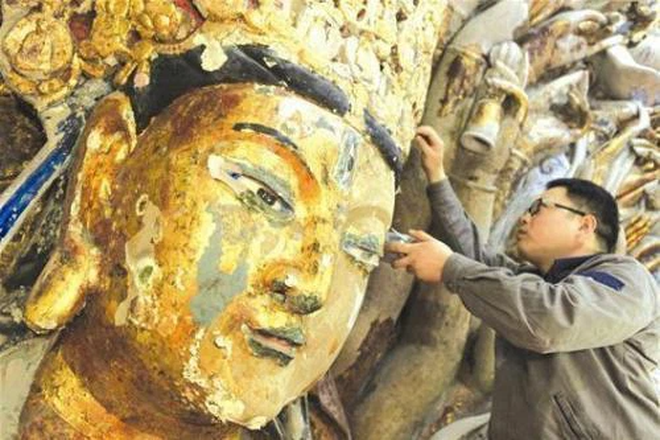 Sửa tượng Phật Quan Âm nghìn tay 800 năm tuổi, đoàn công tác kinh ngạc phát hiện không gian bí mật bên trong - Ảnh 4.